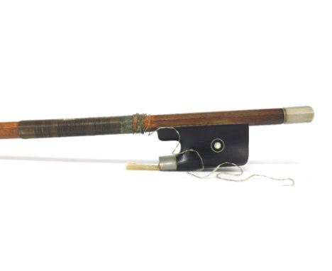 Interesting nickel mounted violoncello bow stamped Voirin, the stick round, the ebony frog inlaid with nickel rings enclosing