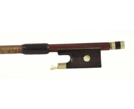 French violin bow by Cuniot-Hury/Ouchard and stamped Morizot, the stick round, the ebony frog inlaid with pearl eyes and the 