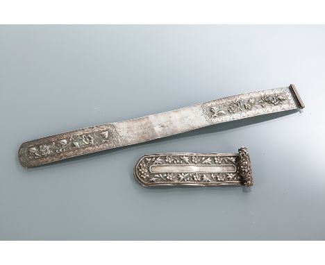 TWO CHINESE SILVER PAGE TURNERS
each embossed with flowers, the smaller one with character marks to underside, 31cm and 12cm 
