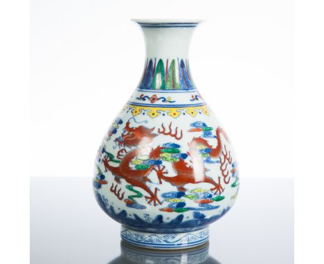 CHINESE CERAMIC VASE
with trumpet neck and globular body, dragon decoration, mark to base, 19cm high 