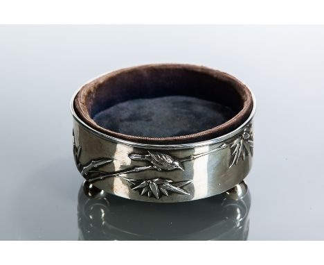 CHINESE SILVER CIRCULAR PIN DISH
embossed with bamboo and a perched bird around the body, on three ball feet, maker Wang Hing