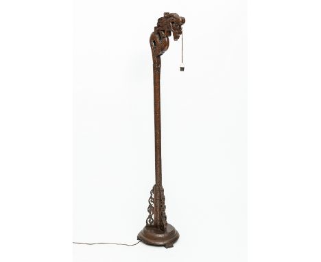 CHINESE CARVED WOOD STANDARD LAMP
with dragon top and on circular base, 178cm high 