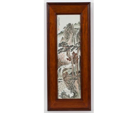 CHINESE CERAMIC PLAQUE IN WOODEN FRAME
depicting a river landscape scene, 97cm x 40cm overall