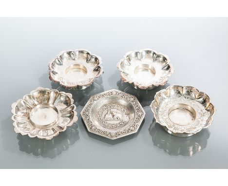 STRAITS CHINESE SILVER OCTAGONAL PIN DISH AND FOUR WHITE METAL CANDLE STANDS
the dish 9.5cm wide (5) 