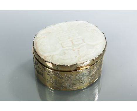 CHINESE SILVER GILT CASKET
the hinged oval lid inset with carved hardstone panel, the body engraved with trailing flowers, ap