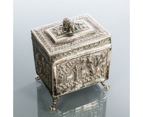 INDIAN SILVER CASKET
the hinged rectangular lid with an elephant finial and embossed with panels of figures and trees, approx