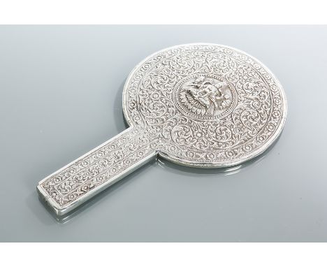 STRAITS CHINESE SILVER HANDMIRROR 
embossed with a central panel showing a deity amongst scrolling foliate borders, 25cm long