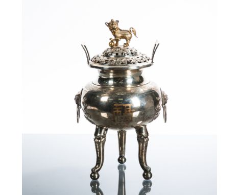 CHINESE SILVER CENSER
with pierced lid and lion dog finial, the body with character and floral designs on three legs modelled