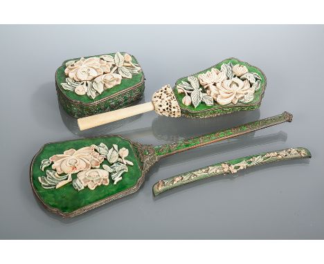 CHINESE ENAMEL DRESSING TABLE SET
on white metal and with ivory effect mountings modelled as floral over the green enamel, co