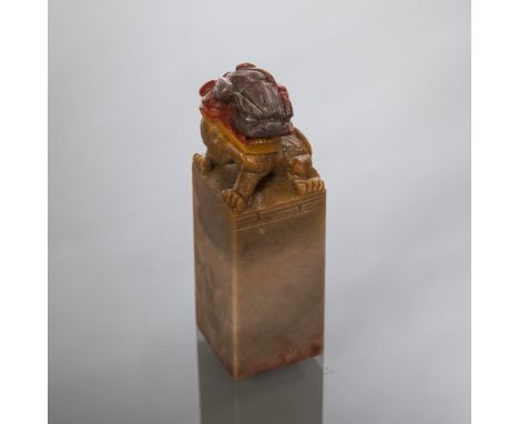 CHINESE SOAPSTONE SEAL 
of rectangukar form with foe dog finial and two character mark to base, 7.5cm high 