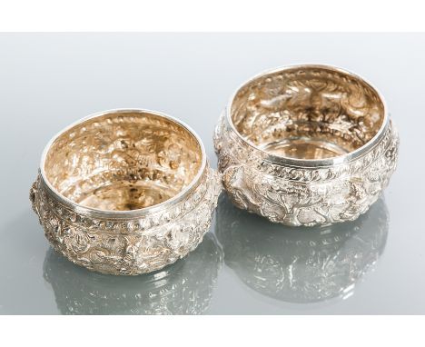 PAIR OF STRAITS CHINESE SILVER CIRCULAR BOWLS
embossed with deities spaced with trees, approximately 148g, 9cm diameter, mark