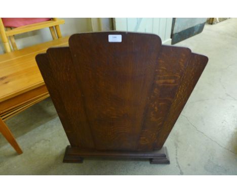 An Art Deco oak firescreen