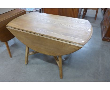 An Ercol drop-leaf table