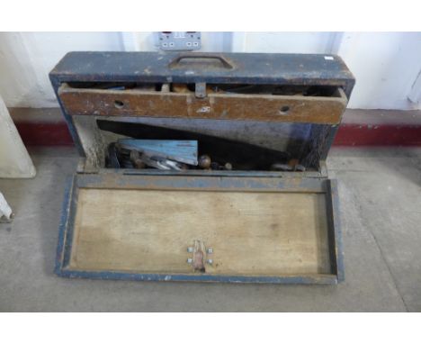 A carpenters tool chest with tools