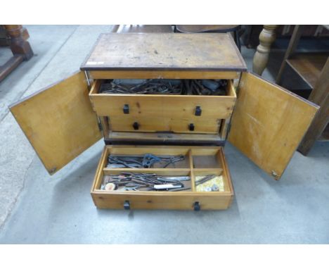 A carpenters tool chest with tools