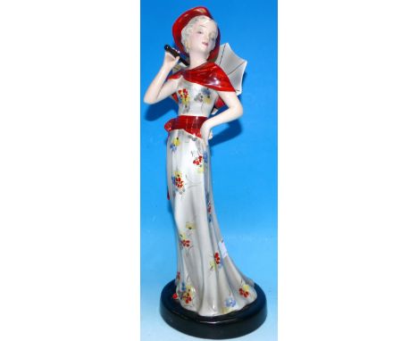 A 1930's Goldscheider Art Deco figure, young woman in long dress with parasol, black printed mark, height 15" (slight chip to