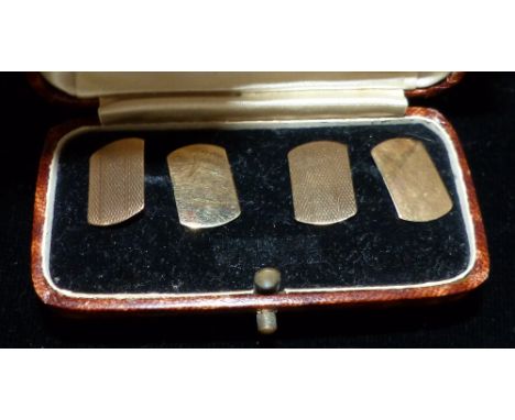 A pair of hallmarked gold engine turned cuff links, 3.2 gm