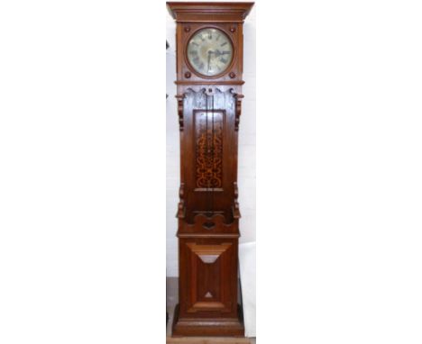 A late 19th century / early 20th century Arts and Crafts style floor standing Vienna style wall clock with moulded cornice an