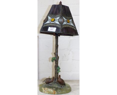 A mid-20th century cold painted table lamp in the form of a tree with 2 grouse, with onyx effect base and Tiffany style shade