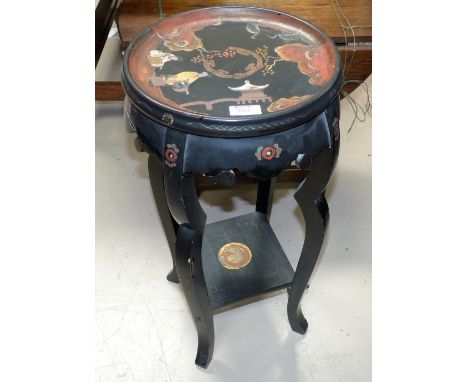 An oriental black lacquered 2 tier plant stand; a similar 2 fold firescreen
