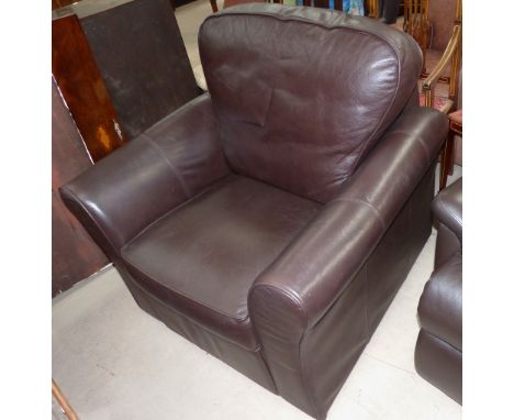 A manual reclining armchair in brown