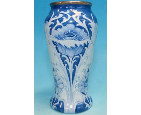 A Moorcroft miniature enamel inverted baluster vase decorated with the early 20th century "Florian" pattern in blue, in origi