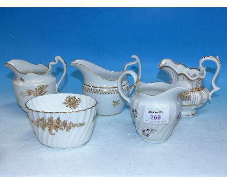 A 19th century Worcester spiral ribbed jug, pattern No 12; 3 other 19th century jugs and a bowl