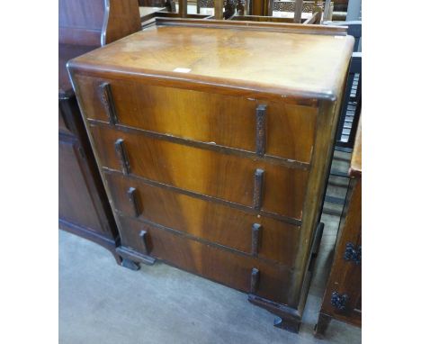 An Art Deco walnut chest of drawers 