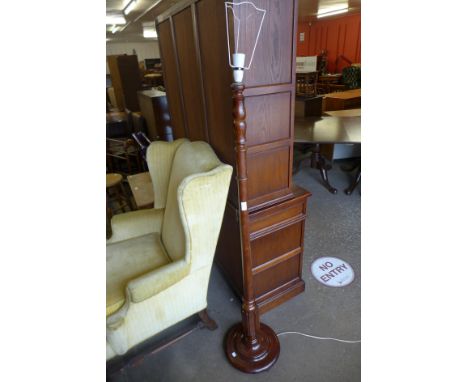 A mahogany standard lamp 