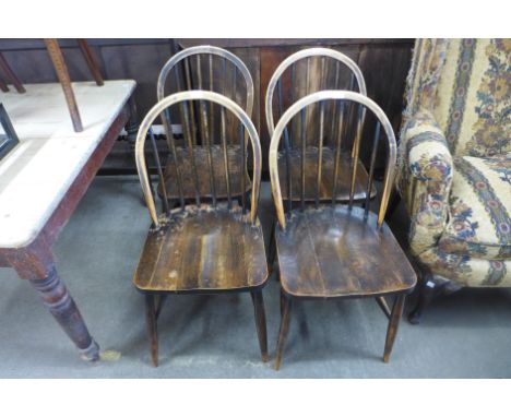 A set of four Ercol kitchen chairs 