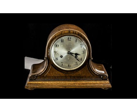 An Oak Cased Napoleon Hat Mantle Clock plus one other.