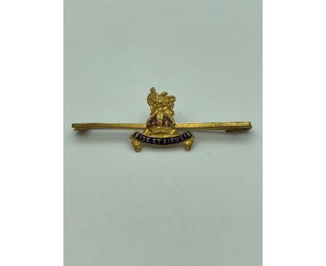 Vintage British Army Pay Corps sweetheart brooch having a Gilded lion standing on the red enamel crown with the insignia mott