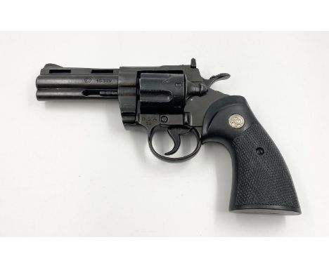 A Replica Heavy Black Metal 357 Magnum. Swing out cylinder. Cocking and firing action. 24cmNOTE! THIS GUN CAN ONLY BE SOLD TO