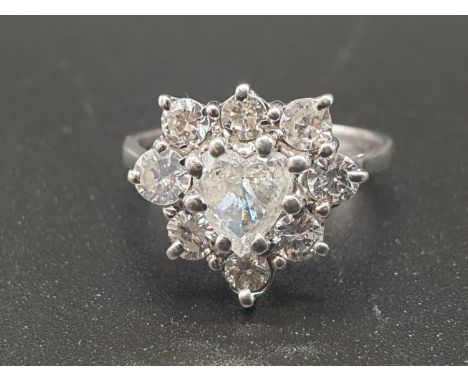 18CT WHITE GOLD HEART DIAMOND CLUSTER RING WEIGHS  3.6G , HAS  1.30CT AND IS A SIZE K 