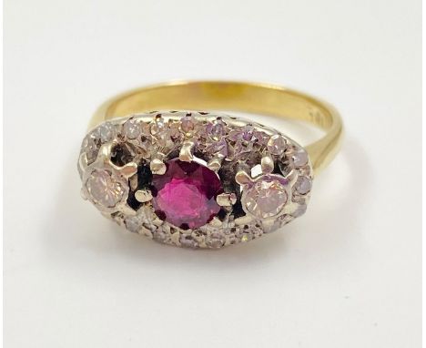 An 18K Yellow Gold Ruby and Diamond Ring. Size P.5.33g 