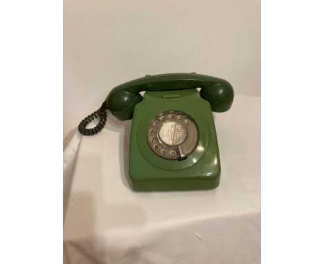 Vintage GPO 1970s telephone dial up model in two tone green. 