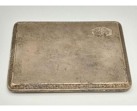 A Vintage Silver Cigarette Case. Markings for London 1927. 11 x 8cm. 95.7g 