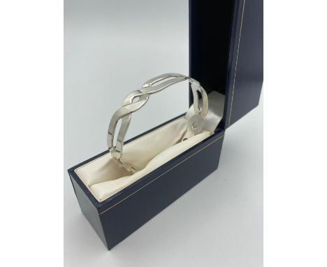 Silver Rennie Mackintosh geometric Celtic design bangle. Having full  Rennie Mackintosh Edinburgh hallmark .Presented in attr