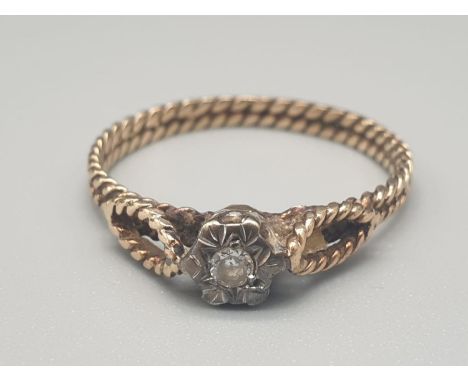 A Vintage 18K Yellow Gold (tests as) Diamond Solitaire Ring. Size P. 1.5g
