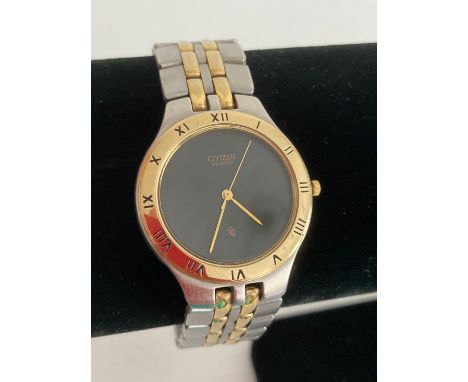 Gentlemans CITIZEN quartz wrist watch.Black face model in two tone metal with sweeping second hand full working order. Excell