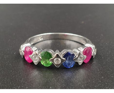 AN 18K WHITE GOLD RING WITH RUBY ,SAPPHIRE AND EMERALD STONES ALTERNATING WITH DIAMONDS WITH A VERY ATTRACTIVE EFFECT.  3.4gm