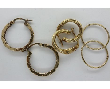 Three pairs of 9ct gold hoop earrings, combined 2.9g, largest hoop H: 20 mm, one hoop is damaged. P&amp;P Group 1 (£14+VAT fo