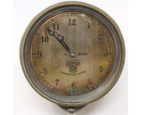 Smiths 8 day car clock, bezel-wind, numbered H-63 991, working at lotting. P&amp;P Group 1 (£14+VAT for the first lot and £1+