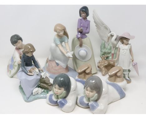 Eight Nao figurines including Resting Herons 0045, largest H: 28 cm, no cracks or chips. P&amp;P Group 3 (£25+VAT for the fir