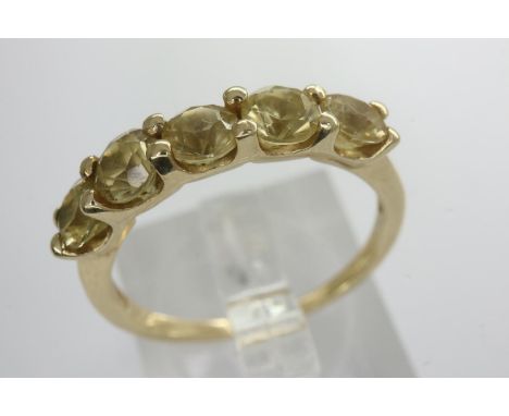 9ct gold channel ring set with five citrine, size O, 2.4g. P&amp;P Group 1 (£14+VAT for the first lot and £1+VAT for subseque