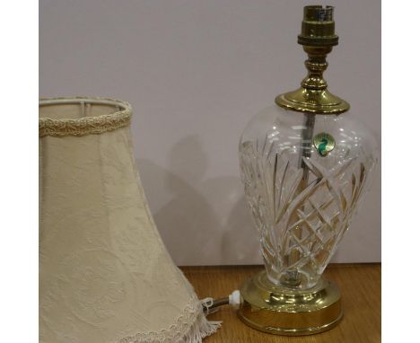 Waterford Crystal table lamp on a circular brass base with shade, H: 39 cm, no visible damages to the crystal body however it