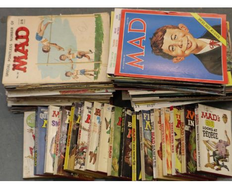 Seventeen Mad books and a large quantity of Mad magazines. P&amp;P Group 2 (£18+VAT for the first lot and £3+VAT for subseque