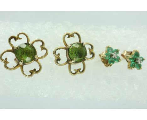 Two pairs of 9ct gold peridot set flower form stud earrings, D: 15 mm, combined 4.1g. P&amp;P Group 1 (£14+VAT for the first 