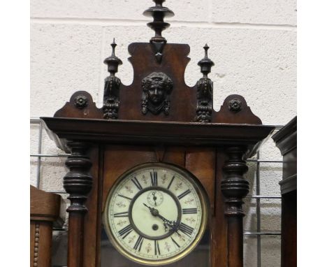 Walnut cased Vienna wall clock, with pendulum display door, H: 126 cm, requires attention. Not available for in-house P&amp;P