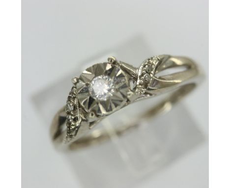 9ct gold diamond set solitaire ring, size K, 1.8g. P&amp;P Group 1 (£14+VAT for the first lot and £1+VAT for subsequent lots)